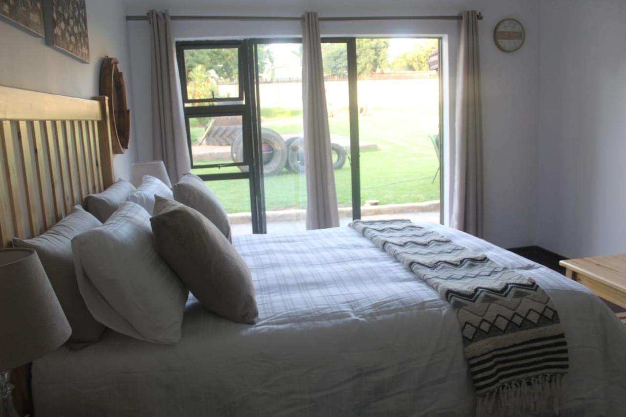 Alu Guesthouse Roodepoort Værelse billede